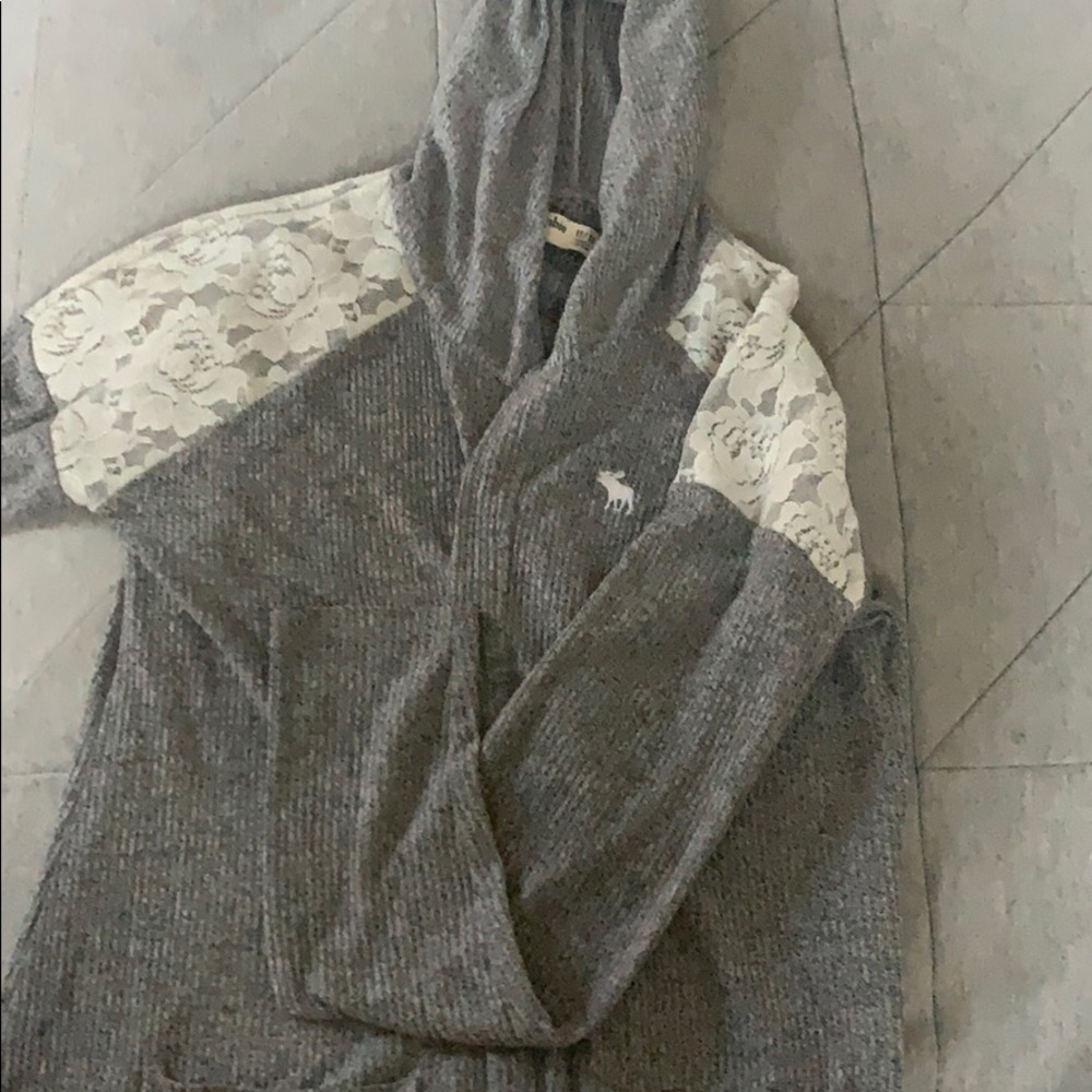 Open grey sweater